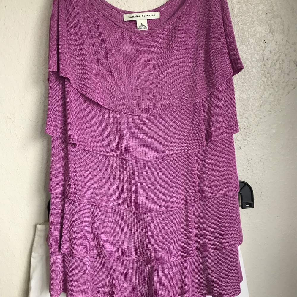 Lavender tank and white skirt.
